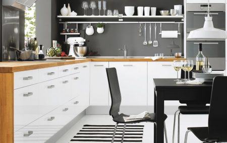 White kitchen-dining room with black accents